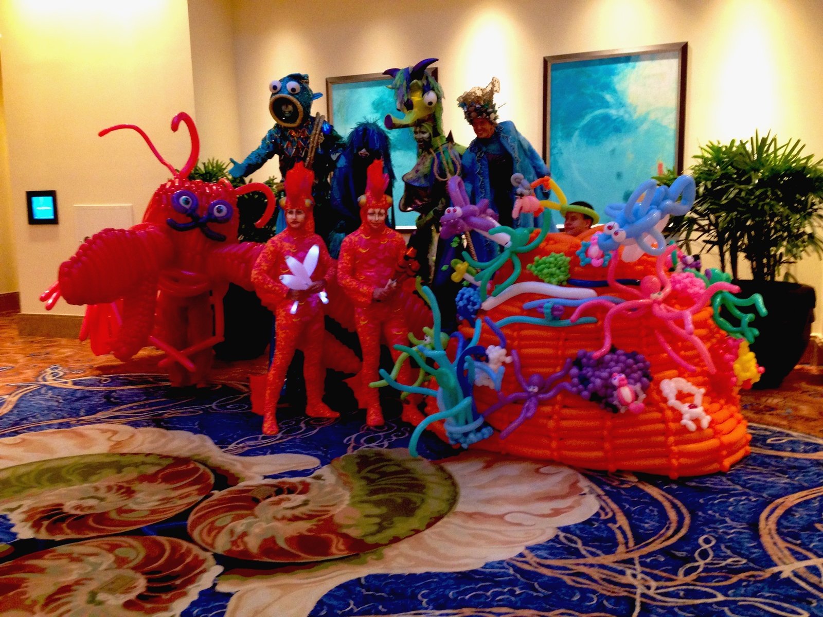 Costumed balloon characters at a community event