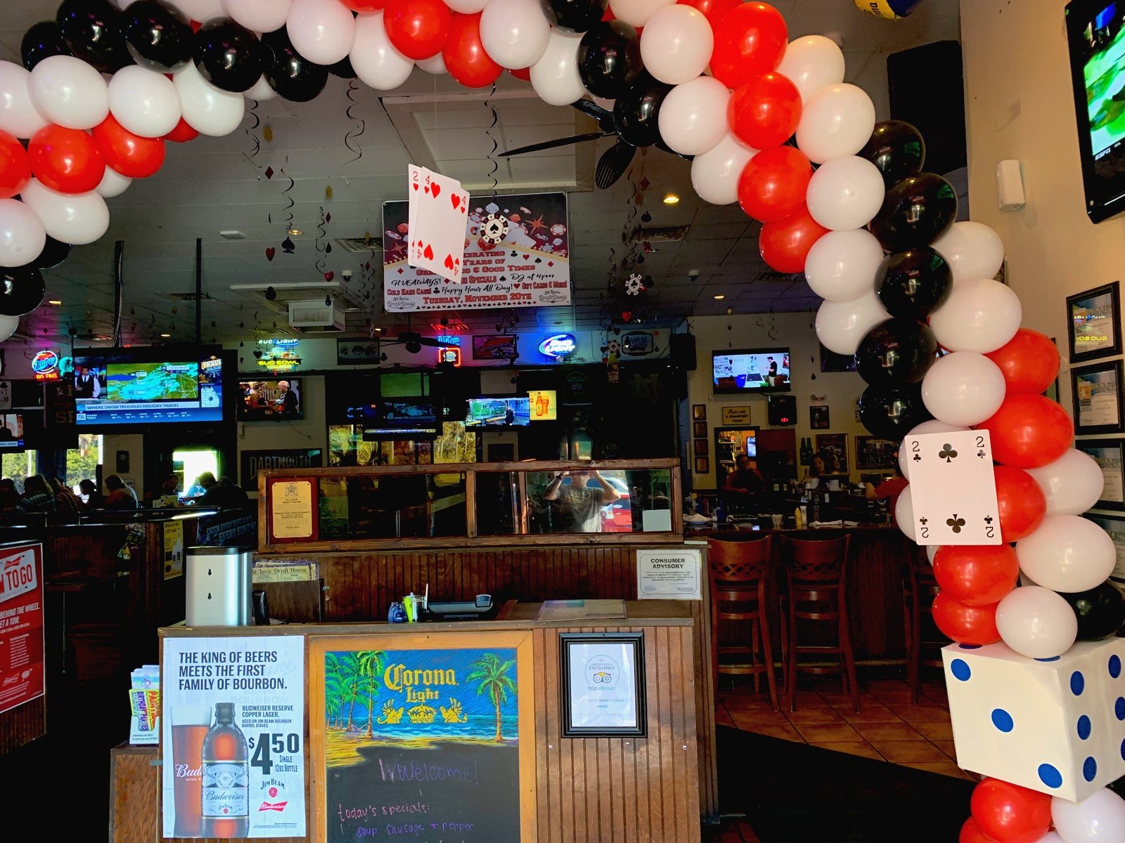 Full venue transformation with illuminated balloon archway